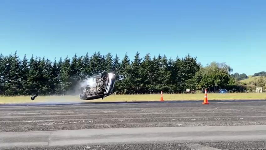 Dramatic impact frame from nitrogen-powered rollover testing.